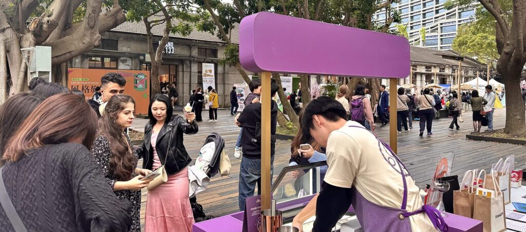 Elliot's ice cream scooping at Lion Travel XINMEDIA festival