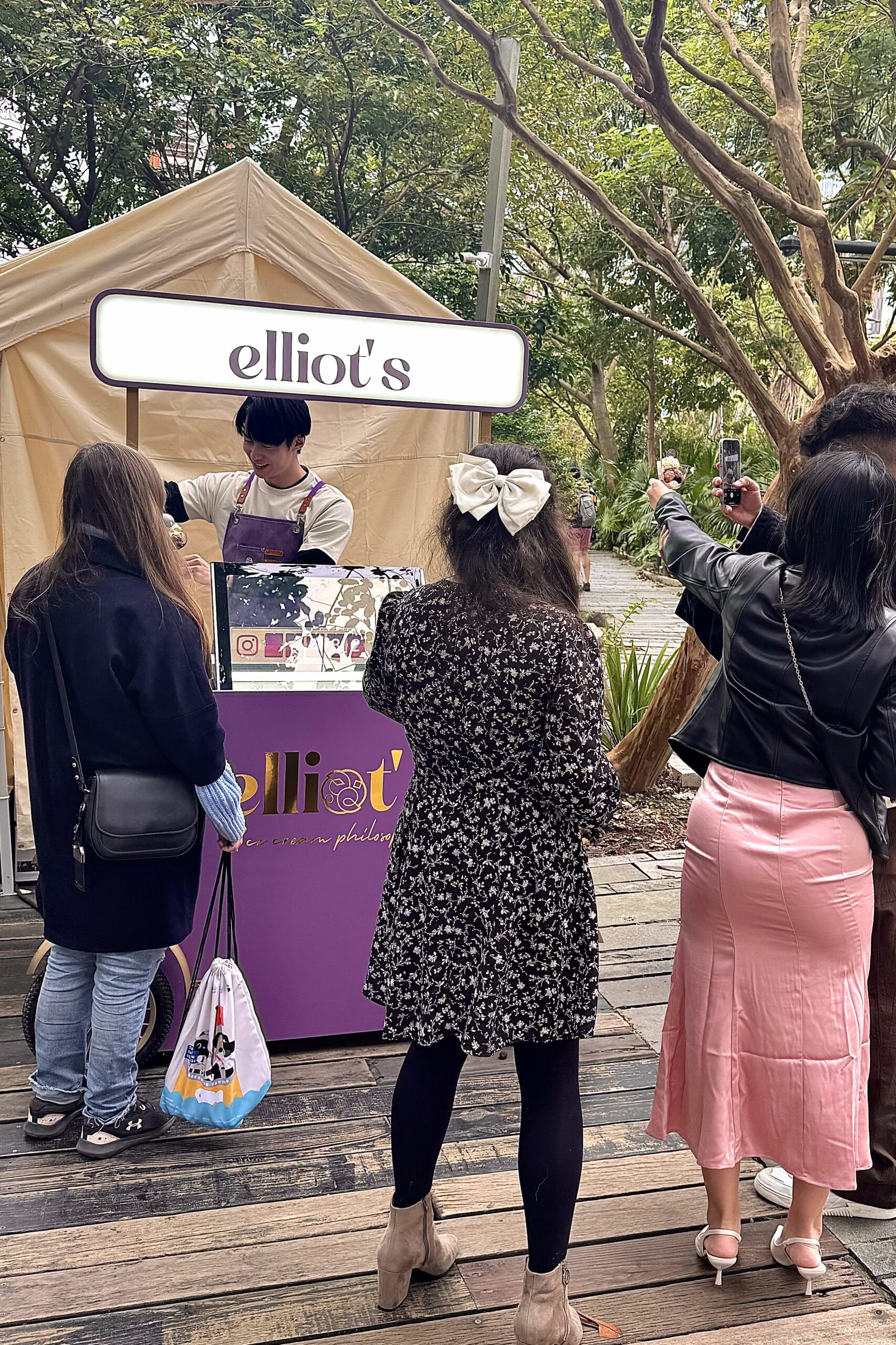 Elliot's ice cream scooper staff serving customers at Lion Travel XINMEDIA festival